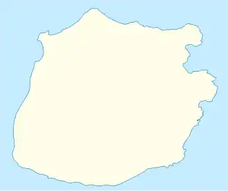 On the circular island of Saba, Ladder Bay is labeled on the western side, about halfway down the coast.