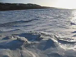 The frozen St. Lawrence River at the Île d'Orléans bridge