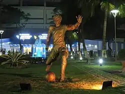 Statue of a player near the main gate of VYBK