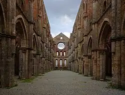 The ruins of a roofless 13-century abbey, the Abbey of San Galgano were used in the filming of 1983's Nostalghia
