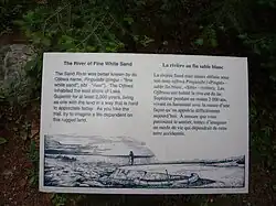 Historical Sign on the Bank of the River