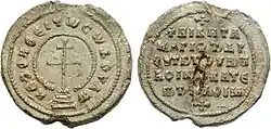 Lead seal with cross surrounded by legend on the obverse and a simple legend in the reverse