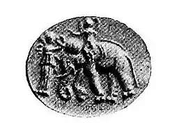 Gandhara seal of king on elephant receiving wreath of victory, a motif with some similarity to the coins of Antialcidas. The art is a mix of both Greek and Indian styles, which was characteristic of the region of Gandhara during the Hellenistic period.