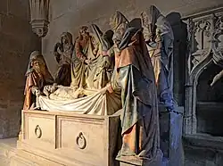 Entombment, attributed to Antoine Le Moiturier, 1490. Notre-Dame Collegiate Church of Semur-en-Auxois.[34]