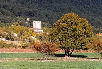 The church tower of Signes, amongst the trees