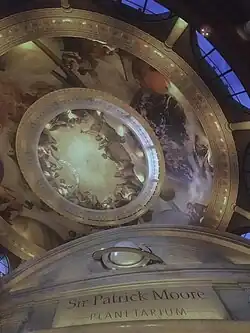The ceiling a 360-degree planetarium which displays images of stars, planets, and constellations
