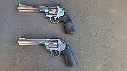 Two revolvers are shown. The first is a Umarex air soft 629, the second is a real Smith & Wesson model 629.