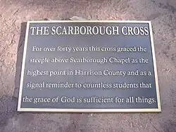 A plate with description under Scarborough Cross