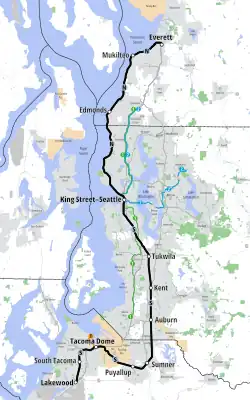 A map of the Seattle area with the two Sounder lines highlighted as they run along the coastline to the north and along several straight sections to the south.