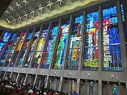 Shiny silver coin with profile of Washington bust