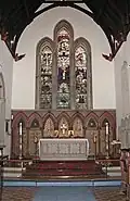 Chancel with high altar and reredos