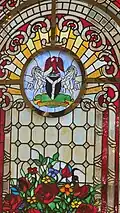 Stained glass showing the coat of arms of Nigeria at the Embassy of Nigeria, Cairo
