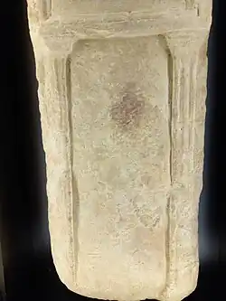 Base with Tuscan pilasters and capitals on the cast in the Musée de Lisieux.