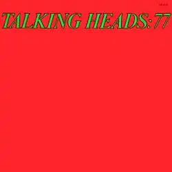 A red cover with "TALKING HEADS: 77" written at the top in green