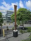 Te Pou Herenga Tangata, a 2019 sculpture at the University of Auckland made from mataī wood.