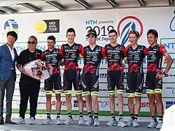 Photograph of Raymond Kreder, Team Ukyo, Kōhei Uchima, Tarō Shirato, Robbie Hucker, Yūma Koishi, Benjamín Prades, Sam Crome, and Tadahiko Kuwabara