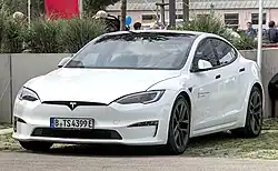 Front three-quarters view of a white Tesla Model S