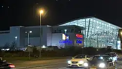The Clairehall Shopping Centre at night.
