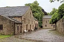 The Great Barn, coach house and old farmhouse to the southwest of the hall