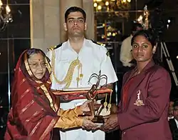 The President, Smt. Pratibha Devisingh Patil presenting the Arjuna Award for the year-2011 to Ms. Tejeswini Bai V. for Kabaddi (Women), in a glittering ceremony, at Rashtrapati Bhavan, in New Delhi on August 29, 2011.