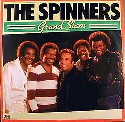 The group standing and smiling for a photo