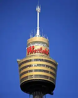 The turret of the tower, with current Westfield branding
