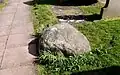 The boulder over the grave of Meg Shelton