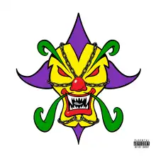 a monstrous clown-like face covered by chains