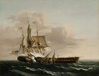 Picture of a sail-powered warship with guns ablaze.