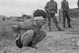 Thuong Duc, Vietnam - A Viet Cong prisoner awaits interrogation at the A-109 Special Forces Detachment in Thuong - NARA - 531447