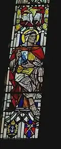 Thurrock window. One of the four Apostles with crests below of Navy and Army. Photograph courtesy Roger Going.