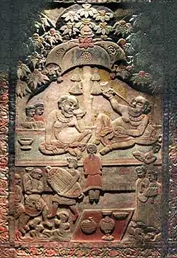 Tomb panel showing a drinking party in a garden.[2]