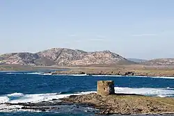 Asinara island with the Aragonese Torre della Pelosa (16th century), Sardinia.