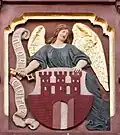 The coat of arms of Toruń on the building