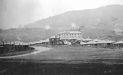 The company town with its hotel, restaurant, bar, houses, and cement processing plant c. the 1920s