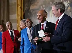 The Congressional Gold Medal was collectively presented to approximately 300 Tuskegee Airmen or their widows, at the U.S. Capitol rotunda in Washington, D.C. by President George W. Bush on March 29, 2007.