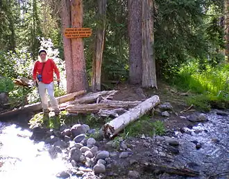 Here Two Ocean Creek splits in two directions on the Continental Divide. Water on the left in this 2011 photo goes to the Atlantic and water on the right to the Pacific Ocean.