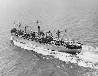 USS Altair underway in 1966. From the appearance of her decks and helicopter landing pad, aft, she is ready to commence an underway replenishment