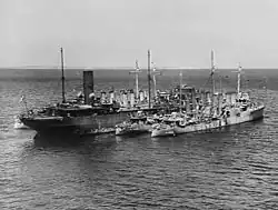 The surviving American destroyers being refueled by USS Victoria upon reaching Australia, March 1942