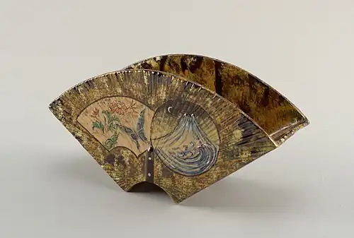 Faience or earthenware vase with two feet, with mountain night scene on the back and a floral daylight scene with butterfly on the front, by Gallé (1884–85), Cooper Hewitt, Smithsonian Design Museum, New York City