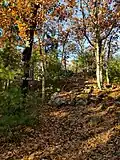 View up the hill toward Tippling Rock in Sudbury Massachusetts near Nobscot Hill Reservation
