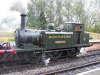 Freshwater visiting the Bluebell Railway (November 2006). The engine has an extended "Isle of Wight" coal bunker (with a higher coal capacity for longer journeys), which finishes closer to the end of the frames.