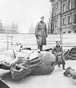German soldiers standing on the destroyed remnants of the monument in 1939