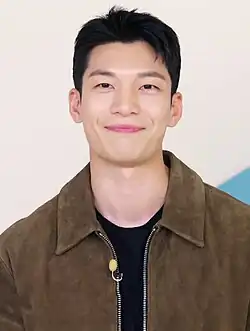 Head shot of Wi smiling