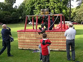 A wicker balloon basket capable of holding 16 passengers