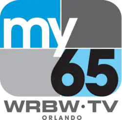 A rounded rectangle divided into blue and gray parts with the word "my" in white and a black "65" in the lower right. Underneath is the text "W R B W TV Orlando".