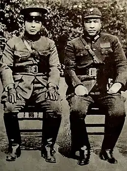 Zhang Xueliang and Yang Hucheng in uniform, sitting for a portrait